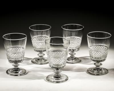 A SET OF FIVE REGENCY FINELY CUT GOBLETS