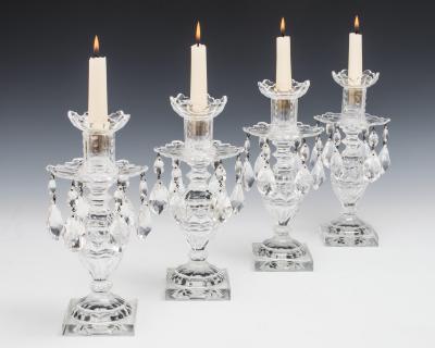 A SET OF FOUR CUT GLASS SLIPOVER CANDLESTICKS IN 18TH CENTURY STYLE
