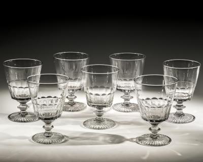 A SET OF SEVEN BUCKET BOWL GOBLETS