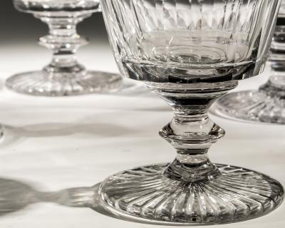 A SET OF SEVEN BUCKET BOWL GOBLETS