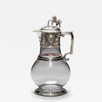 A SILVER PLATED JUG COMMISSIONED FOR UNIVERSITY COLLAGE OXFORD