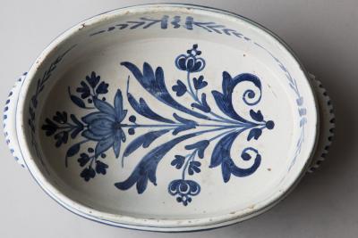 A SMALL FAIENCE TWO HANDLED BASSIN OR JARDINIERE