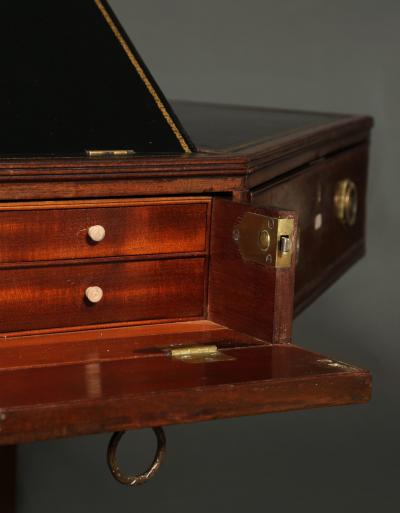 A SPECTACULAR GEORGE III MAHOGANY OCTAGONAL SWIVEL TOP LIBRARY TABLE