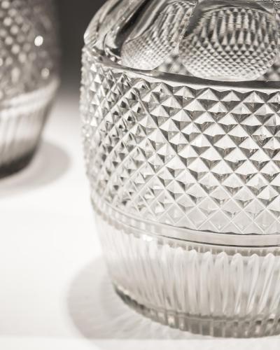 A SUITE OF IRISH REGENCY DECANTERS AND GOBLETS