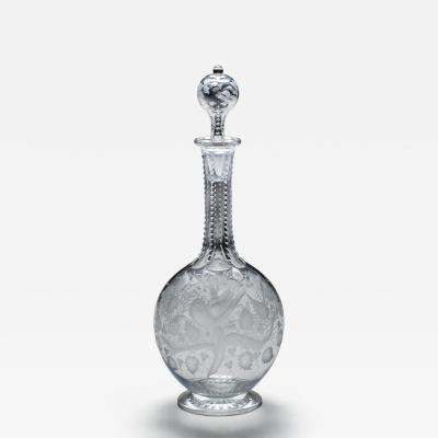 A SUPERBLY ENGRAVED DECANTER DECORATED WITH FRUIT TREES BIRD BUTTERFLY
