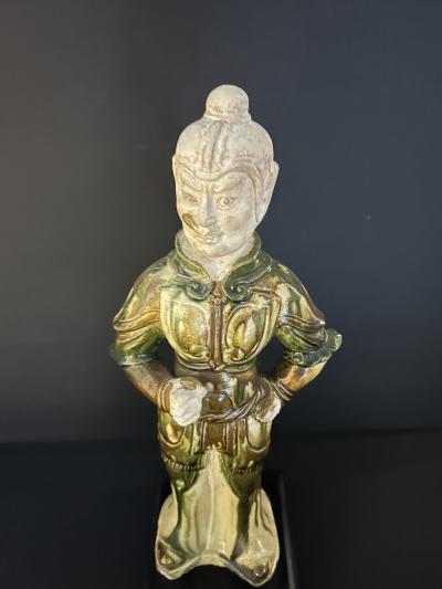 A Sancai Glazed Guardian Figure with Breast Plates and Biscuit Head 