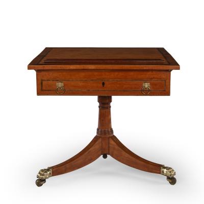 A Satinwood Reading and Writing Table with Campaign Features Possibly Irish
