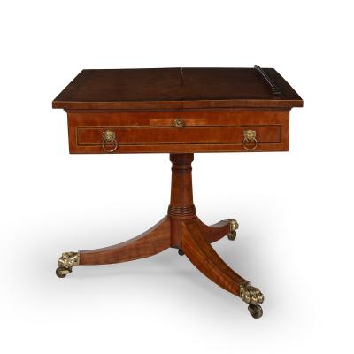 A Satinwood Reading and Writing Table with Campaign Features Possibly Irish