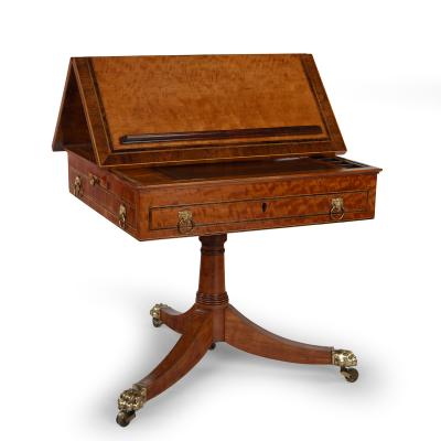 A Satinwood Reading and Writing Table with Campaign Features Possibly Irish