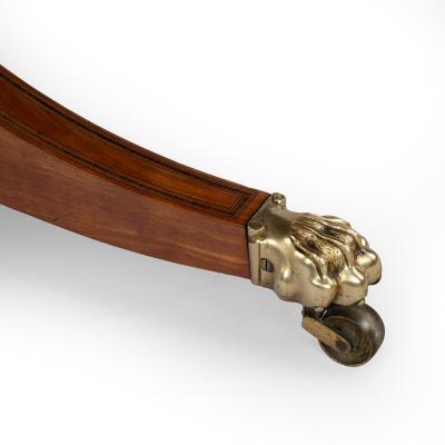 A Satinwood Reading and Writing Table with Campaign Features Possibly Irish