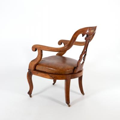 A Sculptural Carved Open Arm Lyre Back Armchair English Circa 1850 