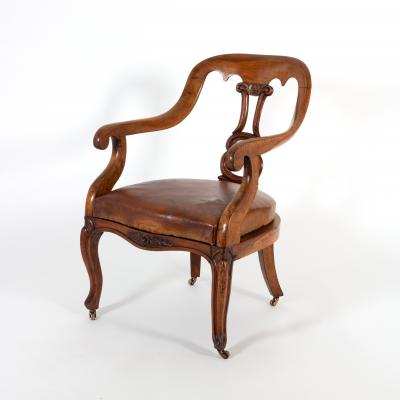 A Sculptural Carved Open Arm Lyre Back Armchair English Circa 1850 
