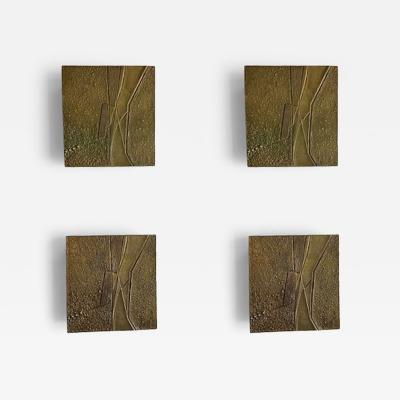 A Set of 4 Italian Modern Bronze and Metal Wall Lights 1960s