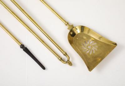 A Set of Brass Leopard Head Andirons