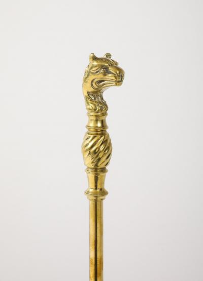 A Set of Brass Leopard Head Andirons