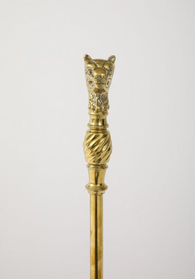A Set of Brass Leopard Head Andirons