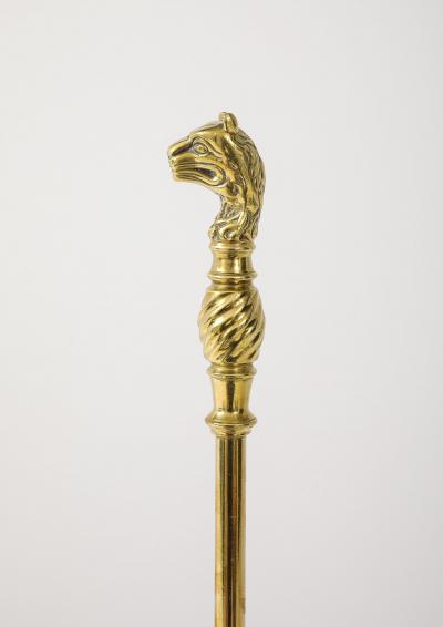 A Set of Brass Leopard Head Andirons