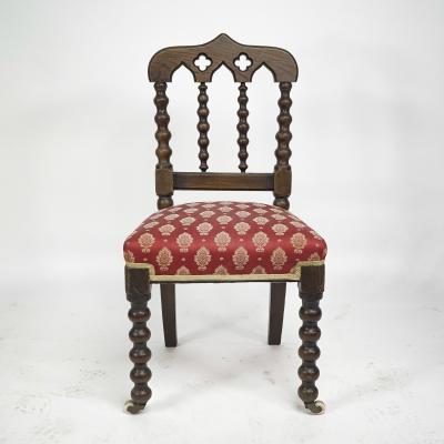 A Set of Four Gothic Revival Bobbin Turned Oak Dining Chairs