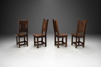 A Set of Four Stained Beech Modernist Dining Chairs France 1950s