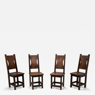 A Set of Four Stained Beech Modernist Dining Chairs France 1950s