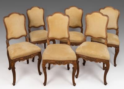 A Set of Six Italian Walnut Side Chairs with Cartouche Shaped Backs