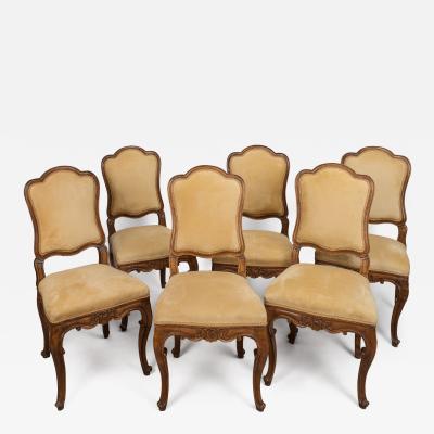 A Set of Six Italian Walnut Side Chairs with Cartouche Shaped Backs