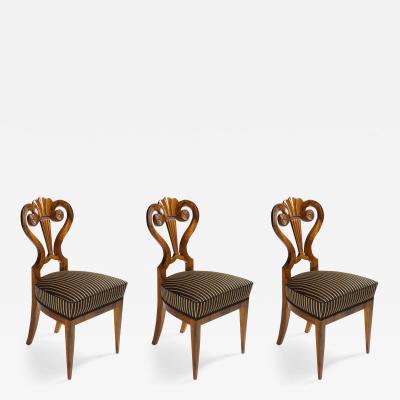 A Set of Three Exceptional Biedermeier Side Chairs