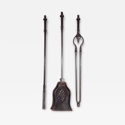 A Set of Three William IV Gunmetal Steel Fire Tools