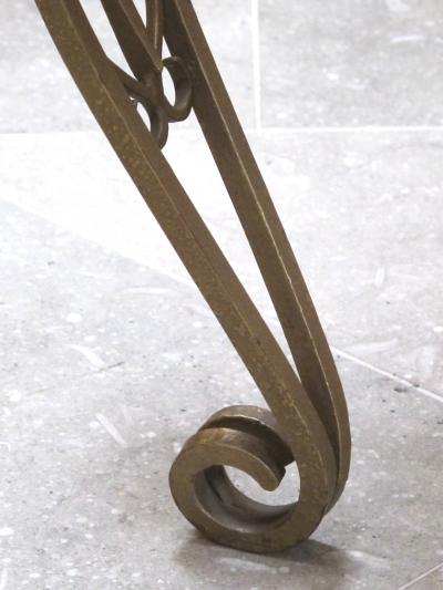 A Shapely French Art Deco Gilt Iron Circular Table with Mirrored Top