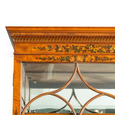 A Sheraton period West Indian satinwood secretaire bookcase
