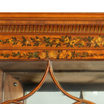 A Sheraton period West Indian satinwood secretaire bookcase