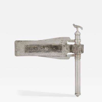 A Silver and Silver Filigree Purim Rattle with Bird Finial