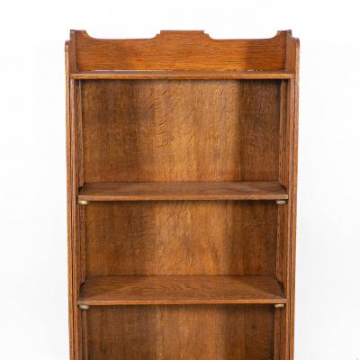 A Small Arts Crafts Oak Bookcase with Adjustable Shelves