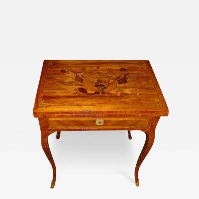 A Splendid 19th Century French Tulipwood and Marquetry Games Table