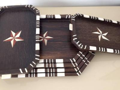 A Stack of Six Antique Wood Trays with Bone Inlays