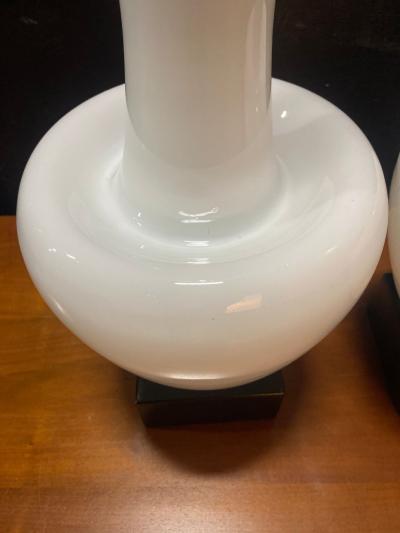 A Statuesque pair of Cased Glass Murano table lamps on Black Walnut bases