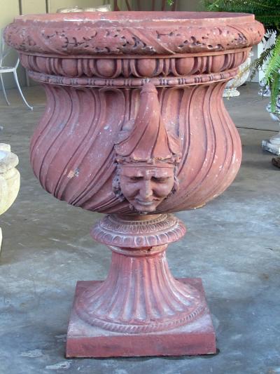 A Stunning English Neoclassical Style Terra Cotta Garden Urn with Mask Handles