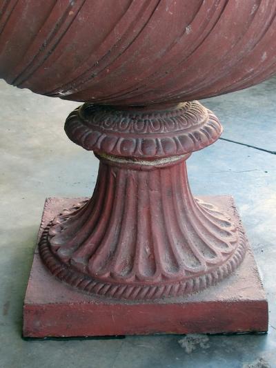 A Stunning English Neoclassical Style Terra Cotta Garden Urn with Mask Handles