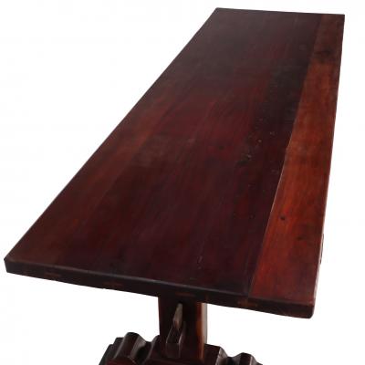 A Substantial Brazilian Trestle Table C 1920 made from a dense wood 