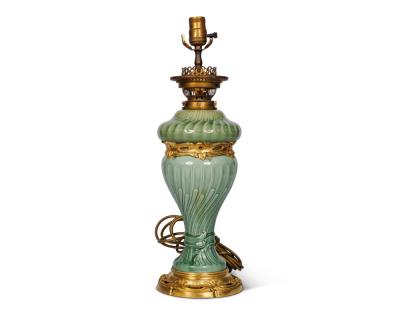 A Suite of Four Theodore Deck Ormolu Mounted Celadon Green Porcelain Lamps