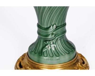 A Suite of Four Theodore Deck Ormolu Mounted Celadon Green Porcelain Lamps