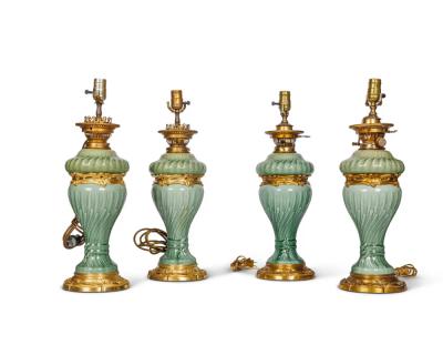 A Suite of Four Theodore Deck Ormolu Mounted Celadon Green Porcelain Lamps