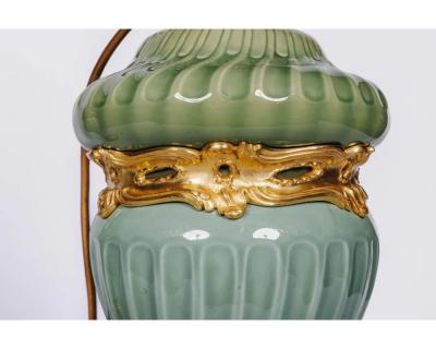 A Suite of Four Theodore Deck Ormolu Mounted Celadon Green Porcelain Lamps