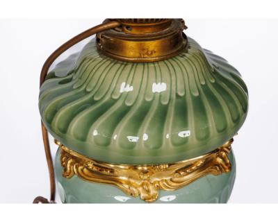 A Suite of Four Theodore Deck Ormolu Mounted Celadon Green Porcelain Lamps