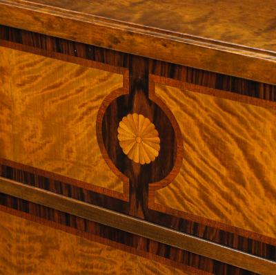 A Swedish Grace Birch and Palisander inlaid chest of drawers Circa 1930s