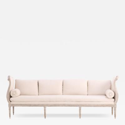 A Swedish Gustavian style painted settee daybed w cushions C 1800 