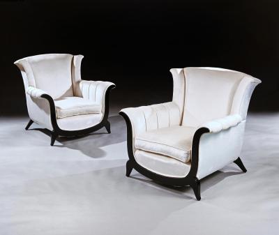 A UNUSUAL PAIR OF FRENCH ART DECO EBONISED ARMCHAIRS IN A CRUSHED VELVET