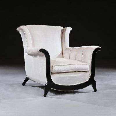 A UNUSUAL PAIR OF FRENCH ART DECO EBONISED ARMCHAIRS IN A CRUSHED VELVET