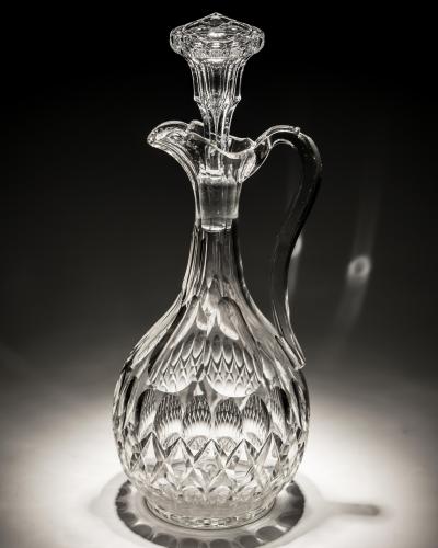 A VICTORIAN PILLAR SCALE CUT CLARET JUG