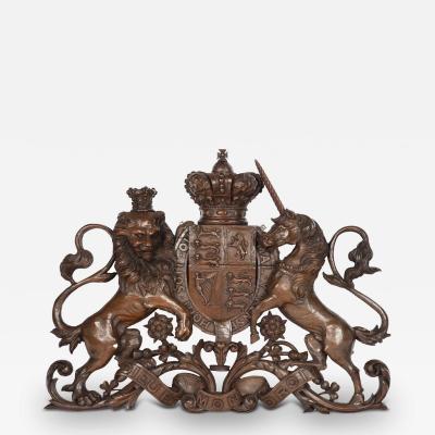 A Victorian carved oak Royal Coat of Arms